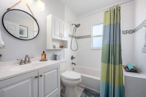 Combined shower/tub, hair dryer, towels, soap