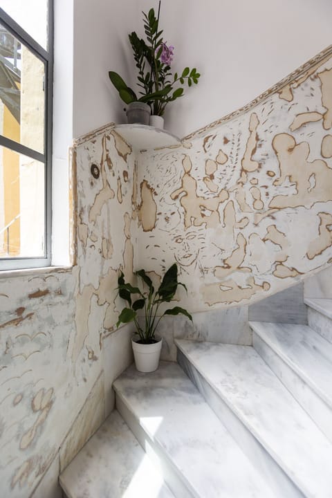 Internal stairs leading to the first floor apartment called EP9U