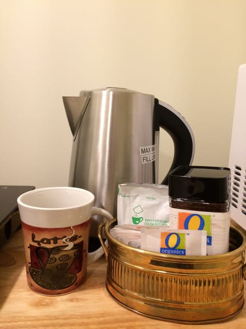 Fridge, microwave, electric kettle, cookware/dishes/utensils