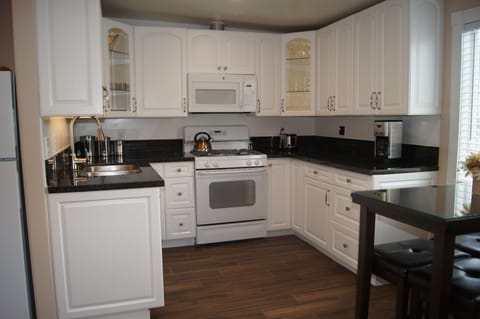 Fully Equipped Kitchen with Everything Needed to prepare your Favorite Dishes