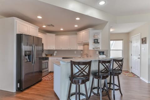 Additional seating for three at bar.