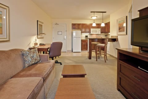 Kick back your feet and relax in the cozy living area.