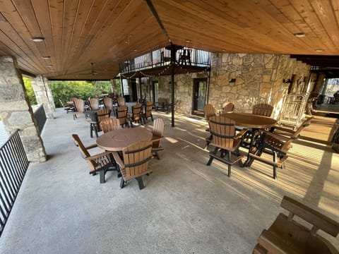 Covered patio that seats about 20 to 25 people 