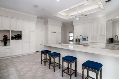 Large, open kitchen with bar seating - perfect spot for the afternoon snacks