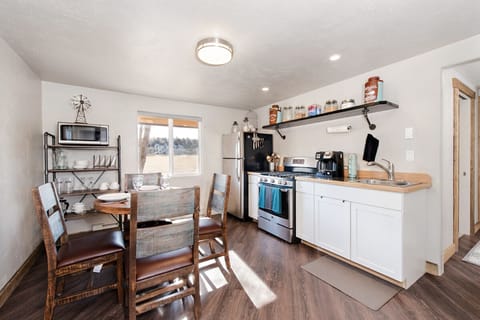 Well equipped kitchen and dining area