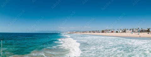 On the beach, sun loungers, beach towels