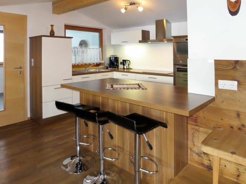 Cabinetry, Furniture, Property, Countertop, Table, Kitchen, Wood, Lighting, Interior Design, Kitchen Appliance