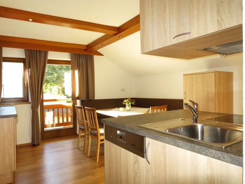 Countertop, Property, Room, Furniture, Kitchen, Cabinetry, Building, Floor, Interior Design, Hardwood