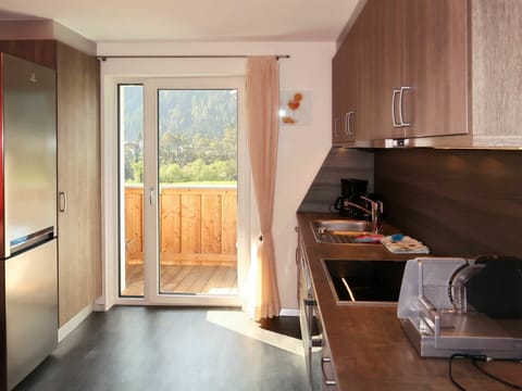 Property, Window, Cabinetry, Wood, Building, Interior Design, Countertop, Flooring, Floor