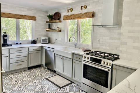 This beautifully remodeled kitchen is fully stocked with everything you need to prepare great meals during your stay.