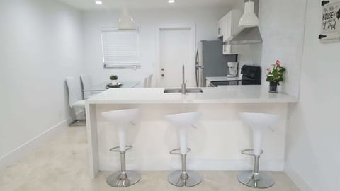 Come enjoy a modern style home and newly renovated 2 BR duplex apartment.