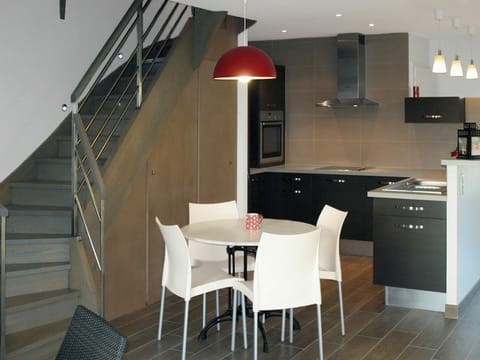 Furniture, Table, Property, Cabinetry, Countertop, Chair, Wood, Lighting, Interior Design, Kitchen Appliance