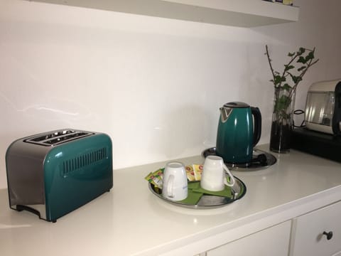 Fridge, microwave, coffee/tea maker, electric kettle