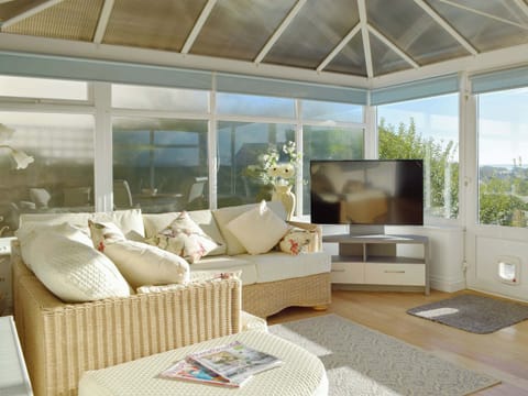 Bright and spacious sun/ dining room | Sweet Pea Cottage, Pwll, near Llanelli