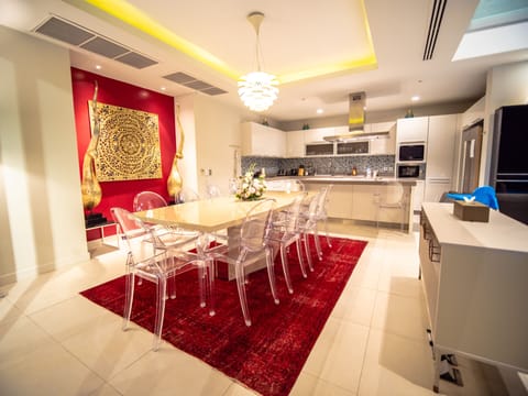 Dining area with seating for 12, open kitchen