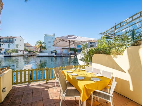 Sky, Water, Table, Property, Furniture, Building, Plant, Chair, Outdoor Furniture, Leisure