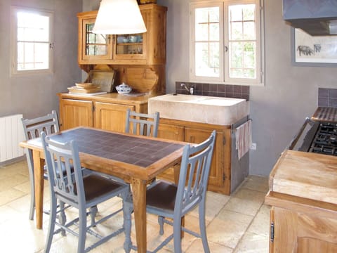 Furniture, Room, Property, Floor, Kitchen, Table, Building, Cabinetry, Hardwood, Interior Design