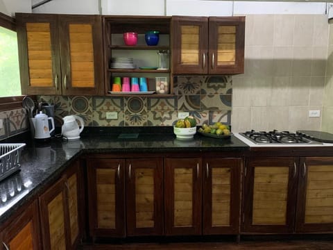 Fridge, coffee/tea maker, electric kettle, cookware/dishes/utensils