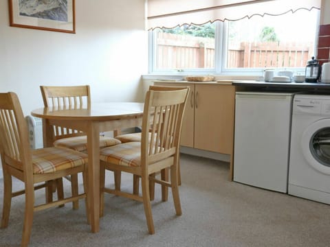 Furniture, Laundry Room, Picture Frame, Cabinetry, Chair, Wood, Window, Kitchen Appliance, Table, Countertop