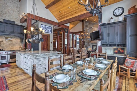 Share a delicious home-cooked meal around the spacious wood dining table.