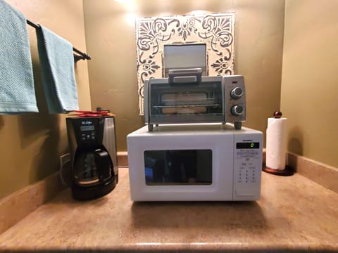 Fridge, microwave, stovetop, coffee/tea maker