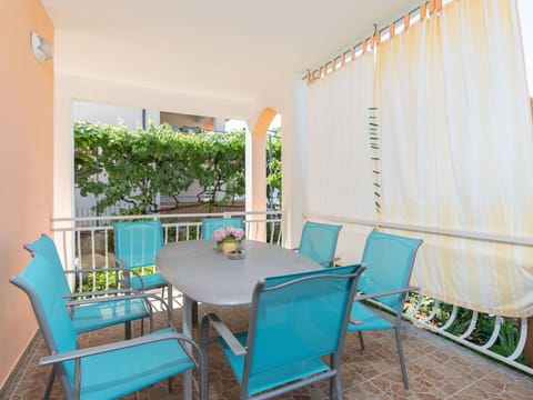 Furniture, Interior Design, Flooring, Floor, Chair, Kitchen & Dining Room Table, Apartment, Dining Room, Balcony, Outdoor Furniture