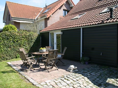 Building, Plant, Window, Chair, Sky, Road Surface, Architecture, Land Lot, Cottage, House