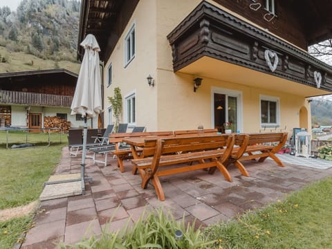 Building, Property, Furniture, Plant, Window, Wood, Shade, Outdoor Furniture, Wall, Grass