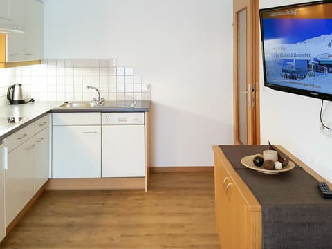 Cabinetry, Countertop, Property, Sink, Kitchen Sink, Television, Furniture, White, Tap, Drawer