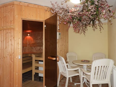 Furniture, Property, Flower, Plant, Chair, Building, Wood, Interior Design, Table, Door