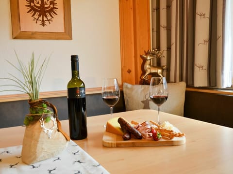 Food, Table, Tableware, Bottle, Property, Furniture, Drinkware, Stemware, Plant, Wine