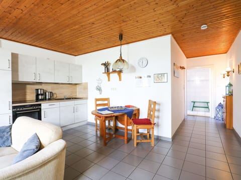 Furniture, Table, Property, Wood, Interior Design, Chair, Couch, Floor, Houseplant, Flooring