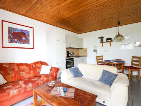 Couch, Furniture, Property, Table, Picture Frame, Wood, Living Room, Lighting, Orange, Interior Design