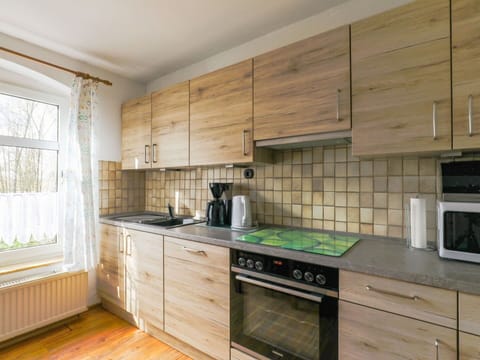 Cabinetry, Countertop, Furniture, Window, Kitchen Appliance, Kitchen Stove, Kitchen, Gas Stove, Home Appliance, Drawer