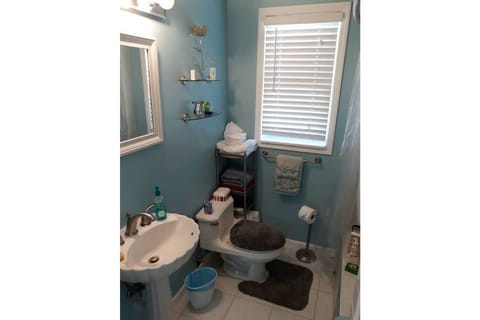 Combined shower/tub, hair dryer, towels, soap