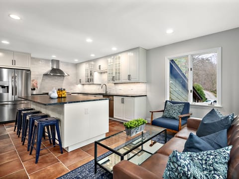 Italian 36" professional propane gas range with stainless steel vent hood.