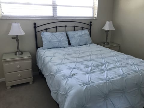 Bedroom with queen size bed. 