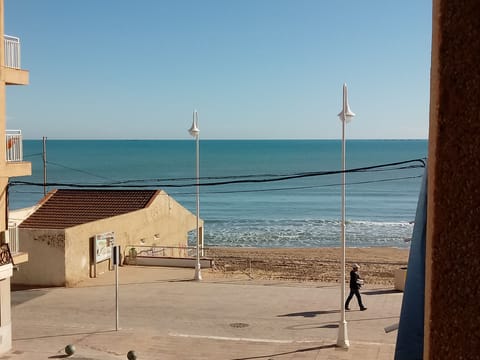 On the beach, sun loungers, beach towels