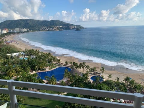 On the beach, sun loungers, beach towels