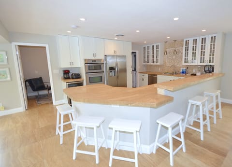 Spacious Open Kitchen (Fully Equipped) Features Counter Dining