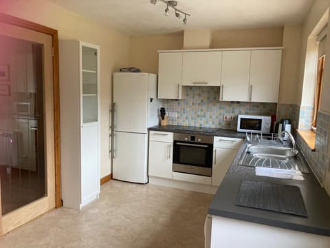 Modern Kitchen with dishwasher fridge freezer washing machine bosch oven and hob