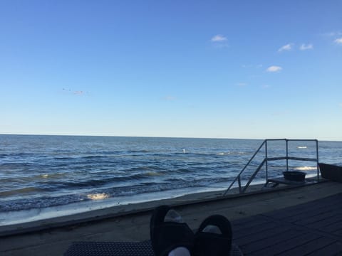 On the beach, sun loungers, beach towels