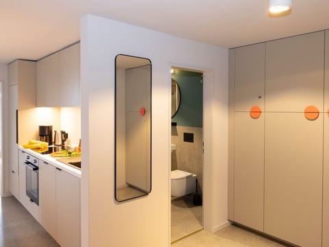 Interior Design, Flooring, Floor, Ceiling, Countertop, Kitchen, Lighting, Furniture, Cabinetry, Room