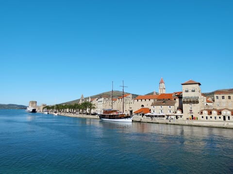 Water, Sky, Cloud, Water Resources, Azure, Tree, Natural Landscape, Beach, Coastal And Oceanic Landforms, Plant
