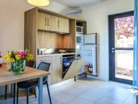 Cabinetry, Property, Furniture, Countertop, Flower, Blue, Lighting, Interior Design, Kitchen, Wood