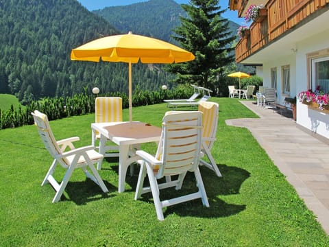 Plant, Furniture, Green, Building, Tree, Outdoor Furniture, Outdoor Table, Chair, Table, Shade