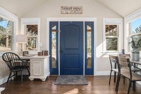 Front door with a dedicated work space and kitchen table