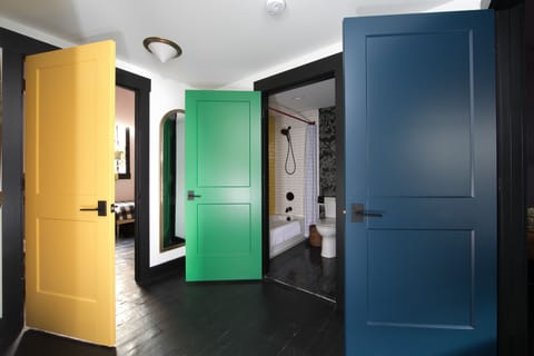 Entrances to two bedrooms and common bathroom.