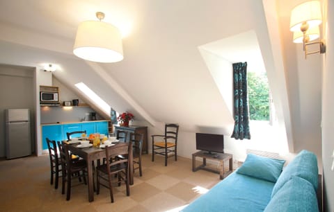 Relax in the gorgeous open-concept living space which adjoins with the dining area.