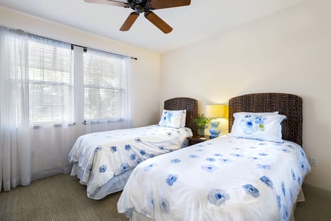 Bedroom 2 with Twin beds and nightstand.